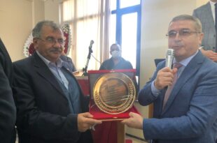 Ayhan Gündoğdu’ya anlamlı plaket