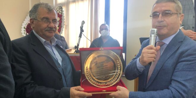 Ayhan Gündoğdu’ya anlamlı plaket